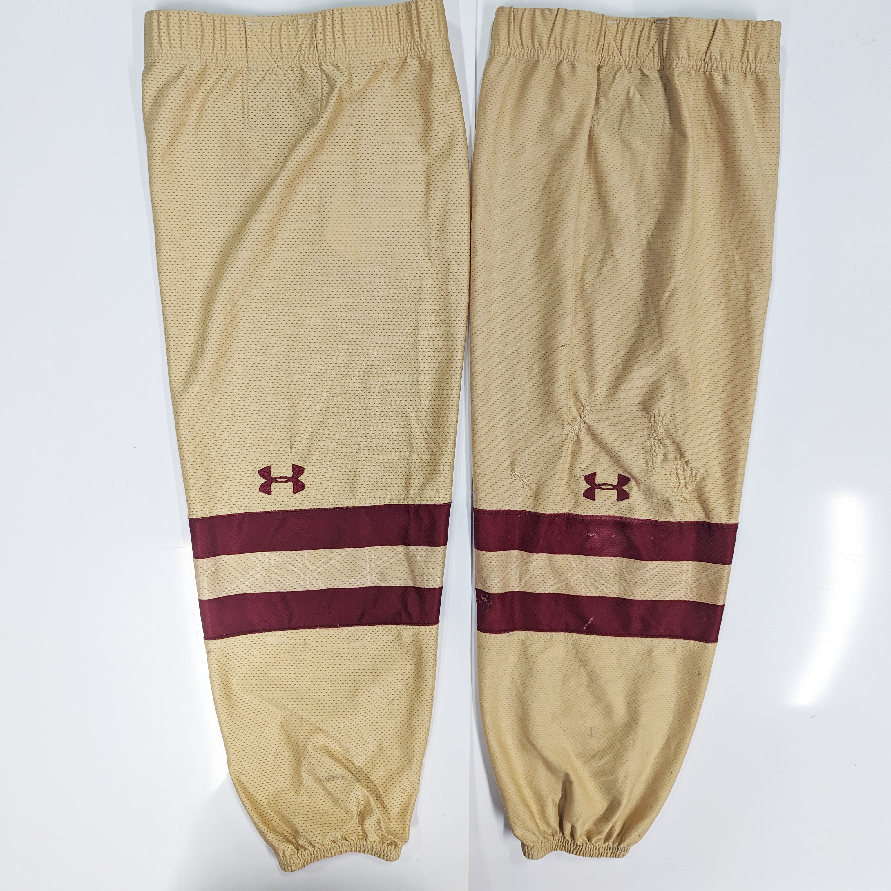 NCAA - Chaussettes de hockey Under Armour d'occasion (or/marron)